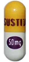 yellow and white capsule 