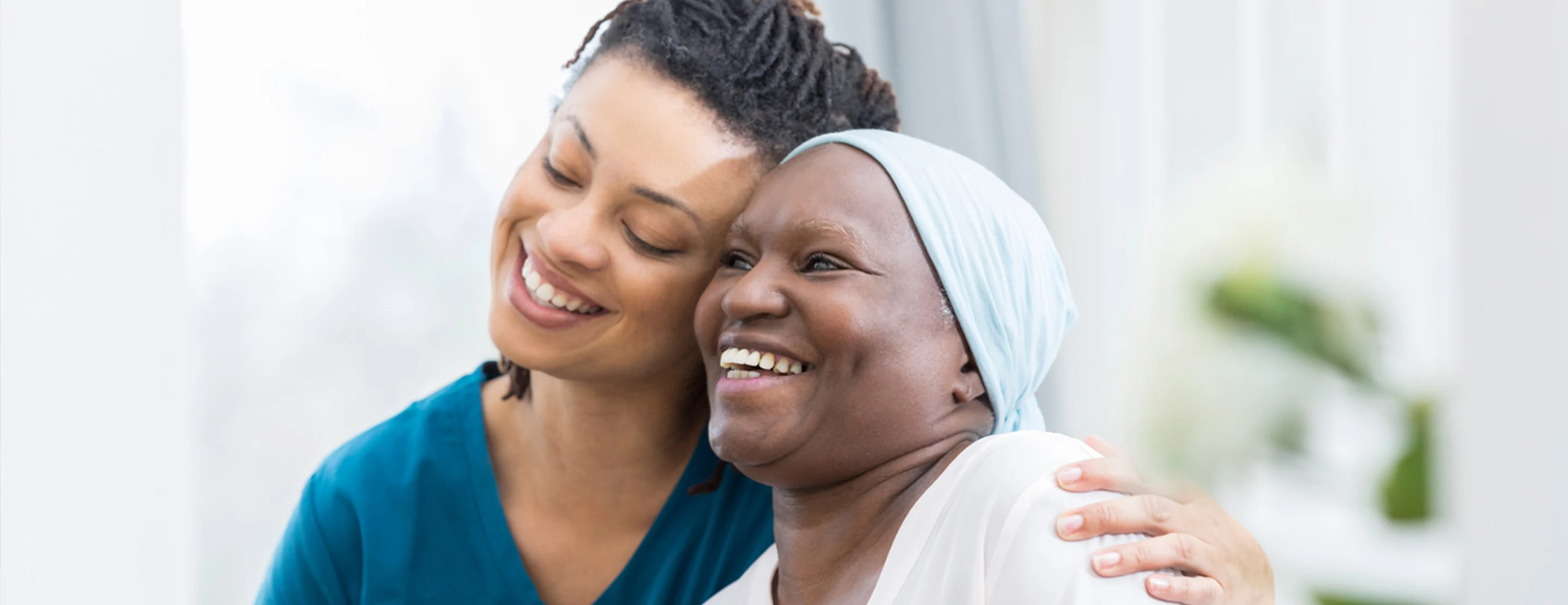 Woman and provider hugging