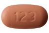 Pink, capsule shaped, tablets, debossed with “123” on one side