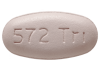 purple, oval, biconvex tablets debossed with “572 Trı” on one side