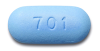 blue capsule-shaped tablet with 701 imprint on one side and GILEAD on the other