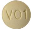 round yellow tablet